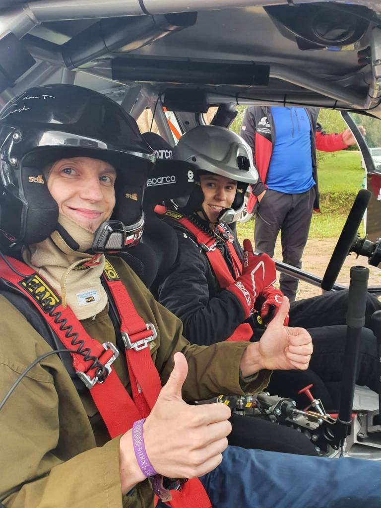 Rally author Vilius Šaltenis in a BMW Rally Car with Gracjan Predko waiting for a test drive